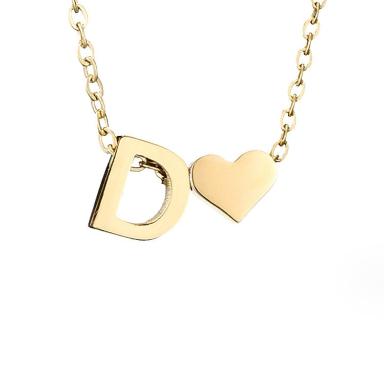 Forever Love & Letter Gold Necklace, close-up of a gold letter D pendant beside a small heart