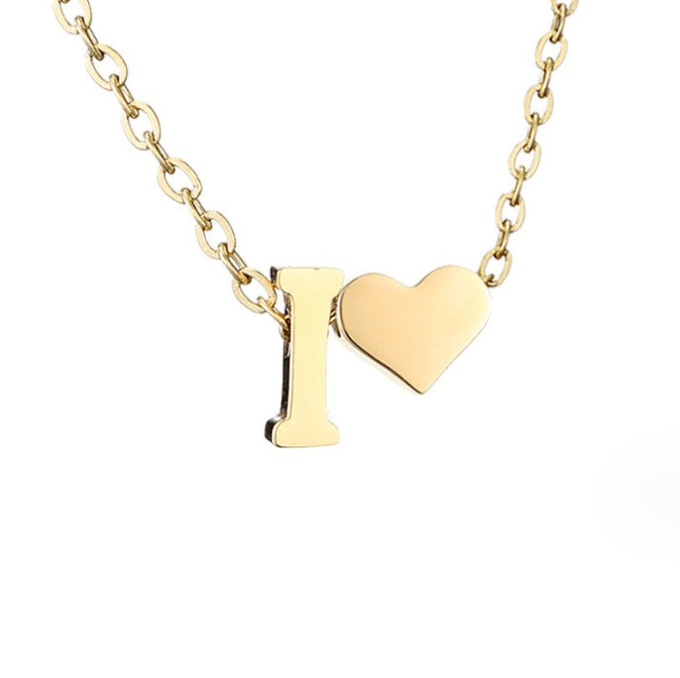Forever Love & Letter Gold Necklace, close-up of gold chain with letter I and heart charms on white