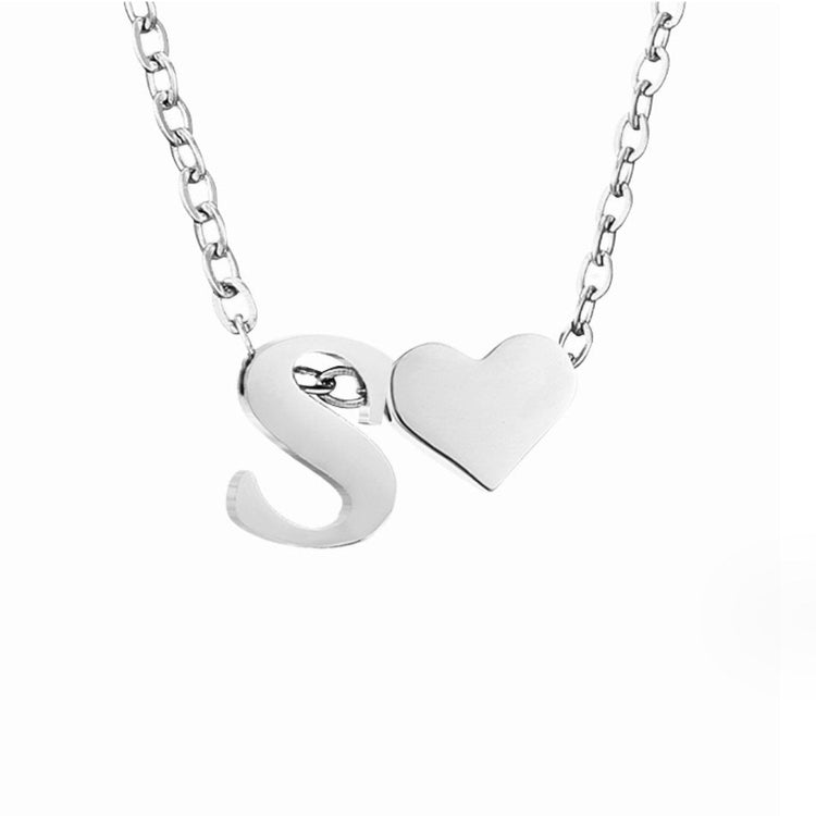 Forever Love & Letter Silver Necklace, close-up on white background, polished silver letter S