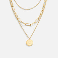 Geya Coin Layered Necklace, three gold chains layered, with a round engraved coin pendant
