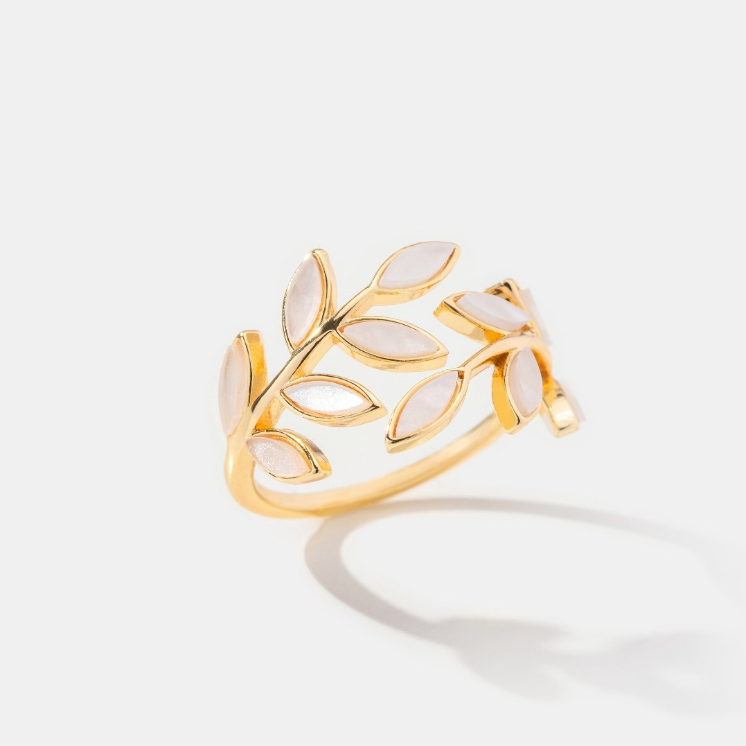 Gold Leaf Ring, gold leaf ring with pale pearly leaves on white background