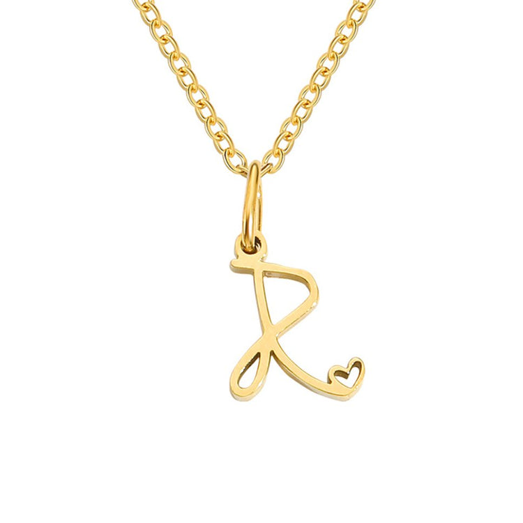 Gold Letter Heart Necklace, gold script letter pendant with a small heart cutout on a chain
