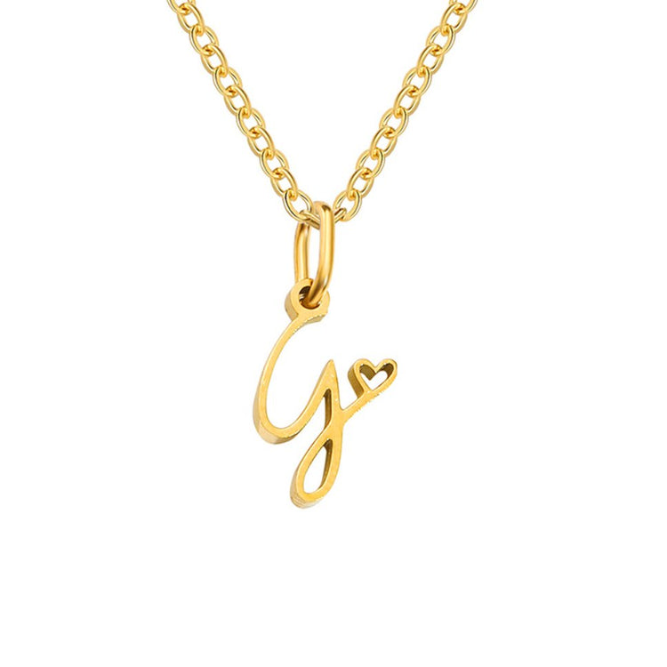 Gold Letter Heart Necklace, gold script letter pendant on a fine chain, white background