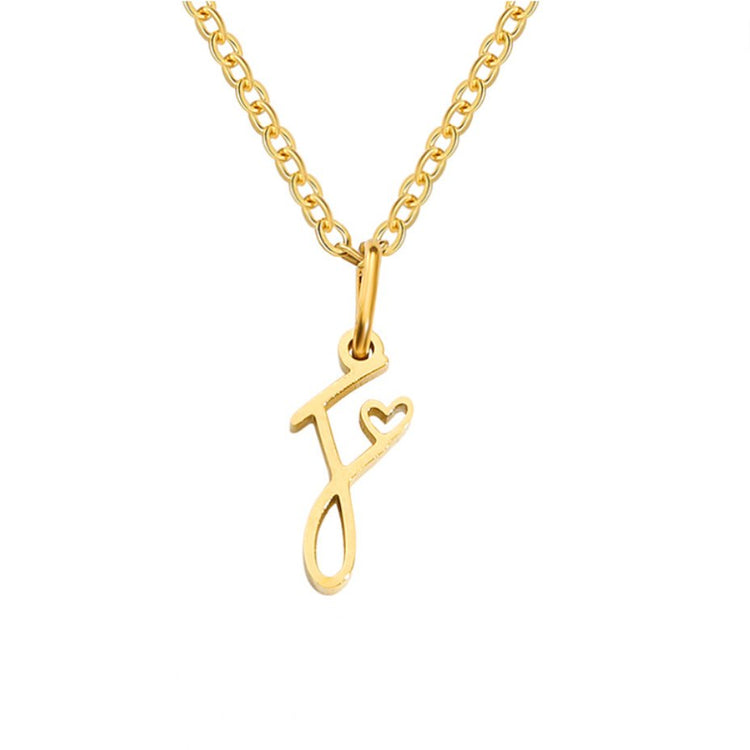 Gold Letter Heart Necklace, gold script initial pendant with a small heart cutout on a chain