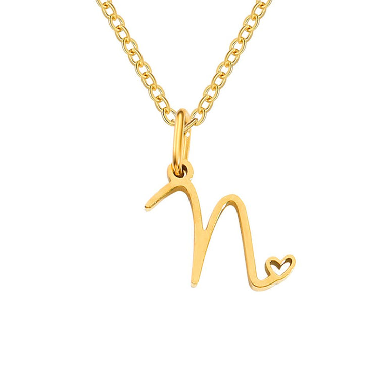 Gold Letter Heart Necklace, gold script letter pendant with a small heart on a chain