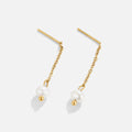 Gold Maria Pearl Drop Earrings, pair of gold chain drop earrings with pearls, on plain background