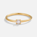 June Birthstone 18K Gold Ring, thin gold band with a small four-prong clear stone, on white