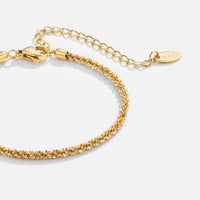 Kai 18K Gold Bracelet, close-up of gold chain bracelet on white background, clasp and extender