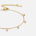 Lana Crystal Droplet Anklet, flat-lay close-up of gold chain with crystal droplets