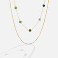 Layered Alana Gold & Stone Necklace, two gold necklaces layered, one with green stone beads