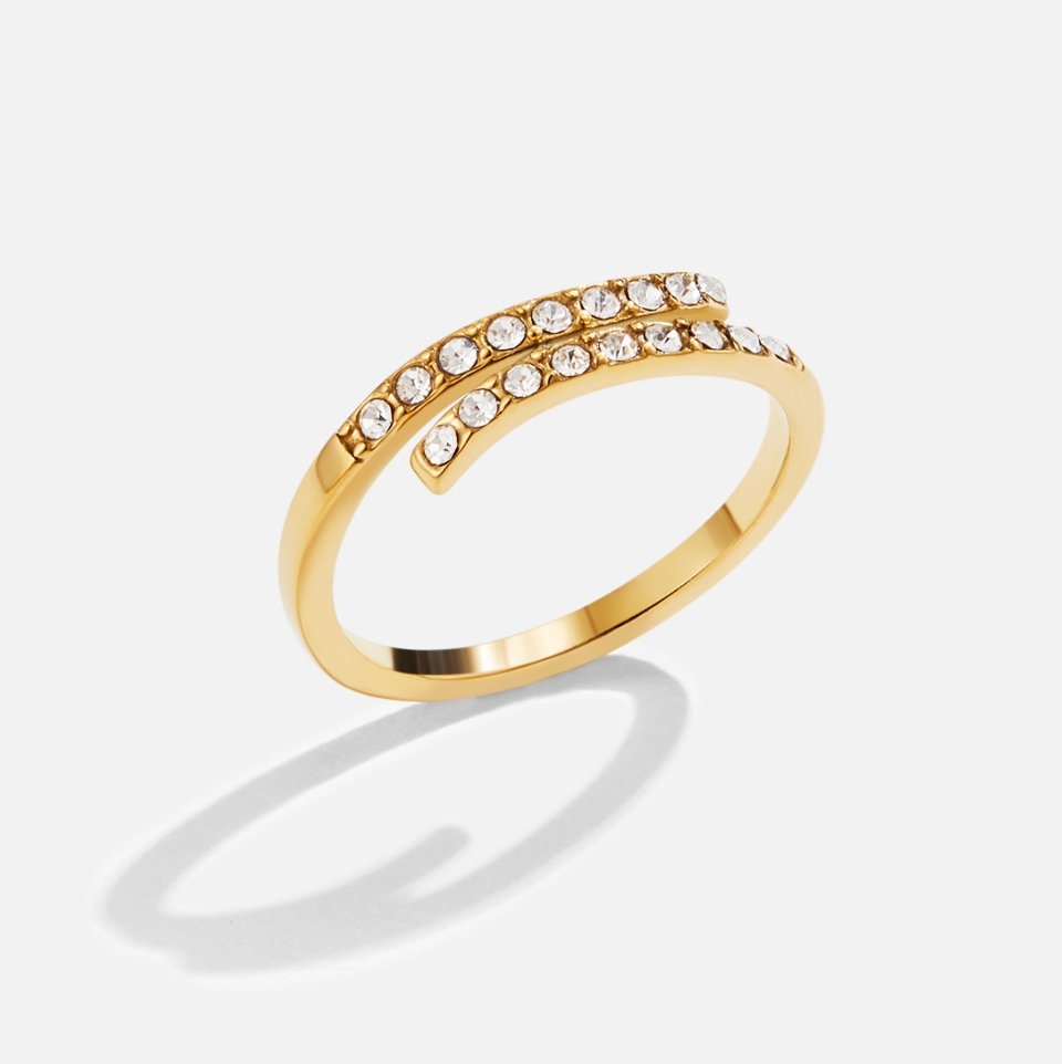 Layered Gold & Crystal Wrap Ring, standing alone on white, gold band with two crystal-set bars