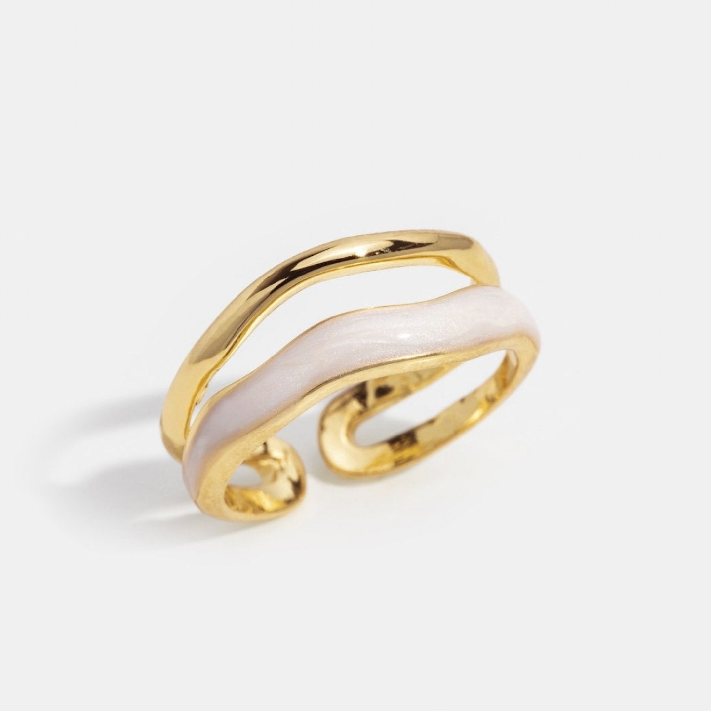 Layered Sahara Gold Ring, gold ring on a plain white background, wavy band with cream enamel stripe