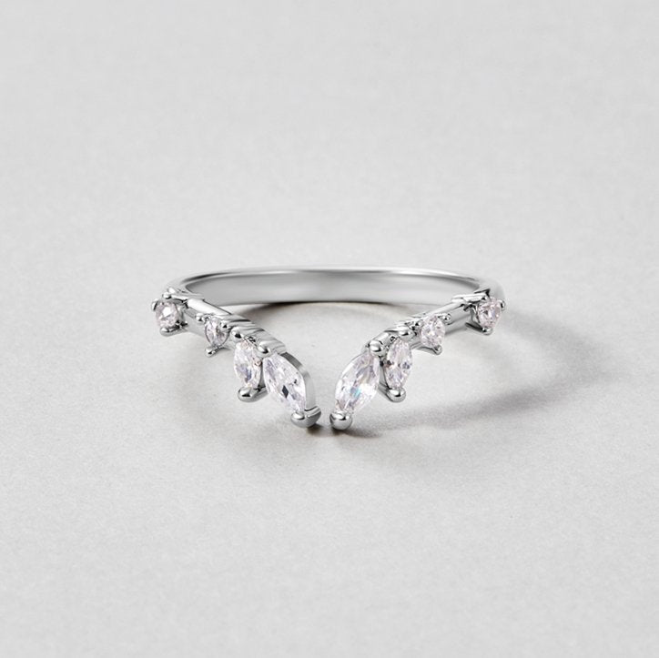 Lily Crystal Silver Vine Ring, silver ring with marquise and round stones on a grey surface