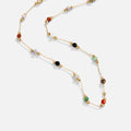 Lulu Beaded Stone Necklace, laid out flat on a white surface, gold chain with coloured stone