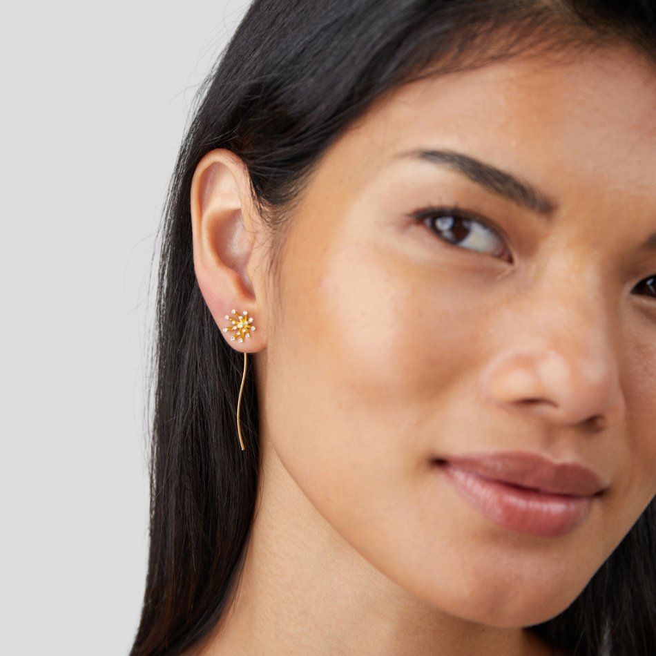 Make A Wish Dandelion 18K Gold Earrings, worn on an ear, gold flower stud with a thin drop wire