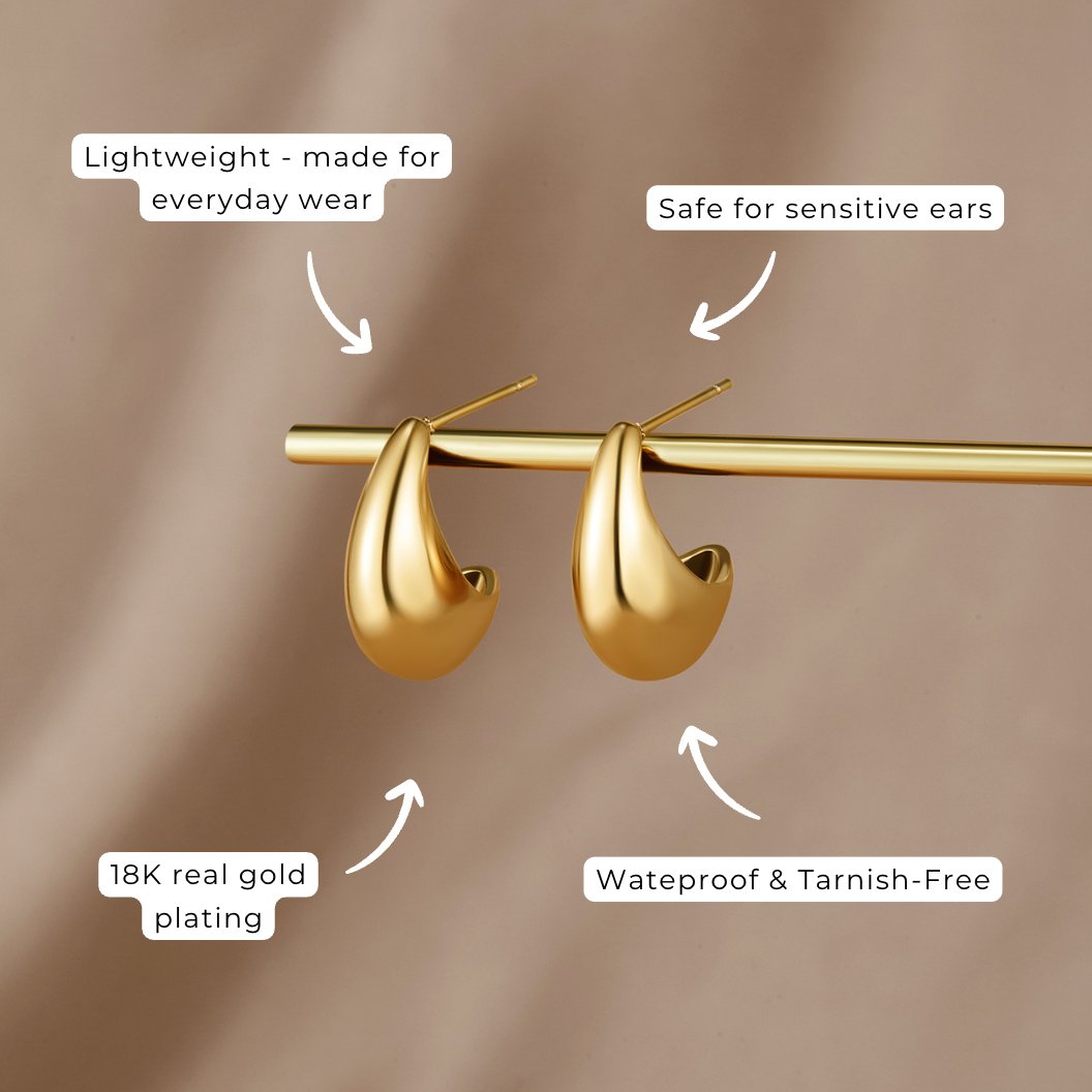 Mini Curved Gold Hoops, two gold teardrop hoop earrings on a gold rod, with feature callouts