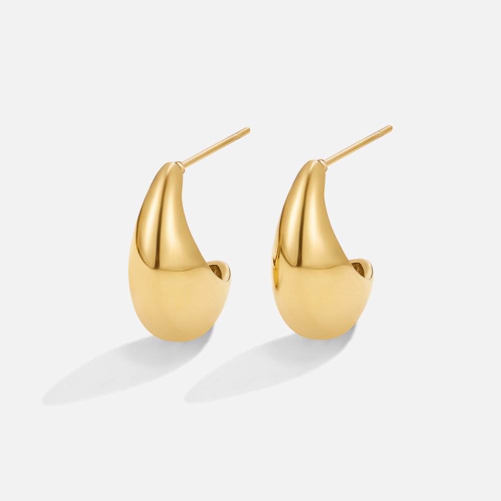 Mini Curved Gold Hoops, pair of polished gold teardrop hoops on white background