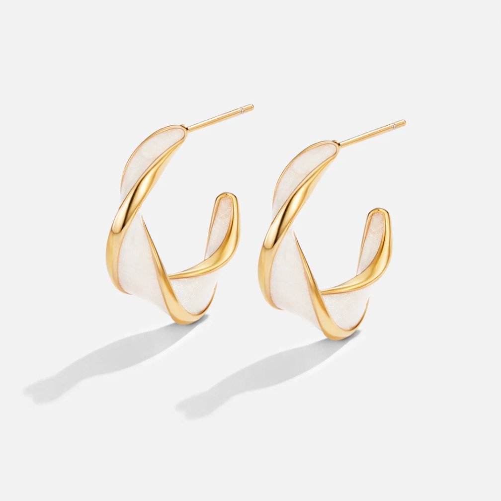 Mother of Pearl Twist Hoop Earrings, a pair of open hoops on a plain background, gold twisted