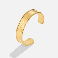 Nica Gold Bangle, gold cuff bangle on white, hammered texture on the wide band