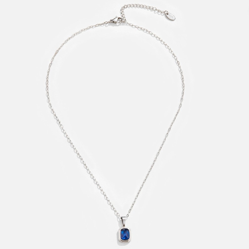 Ocean Blue Pendant Silver Necklace, laid flat on white, silver chain with blue rectangular pendant