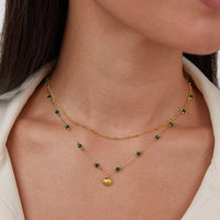 Ocean Lover Shell & Bead Necklace Set, worn layered on a neck, with a gold shell pendant and
