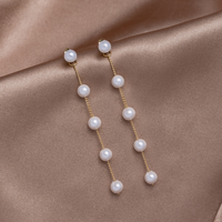 Pearl Drop Earrings, pair of long drop earrings on satin, with pearls on gold chain