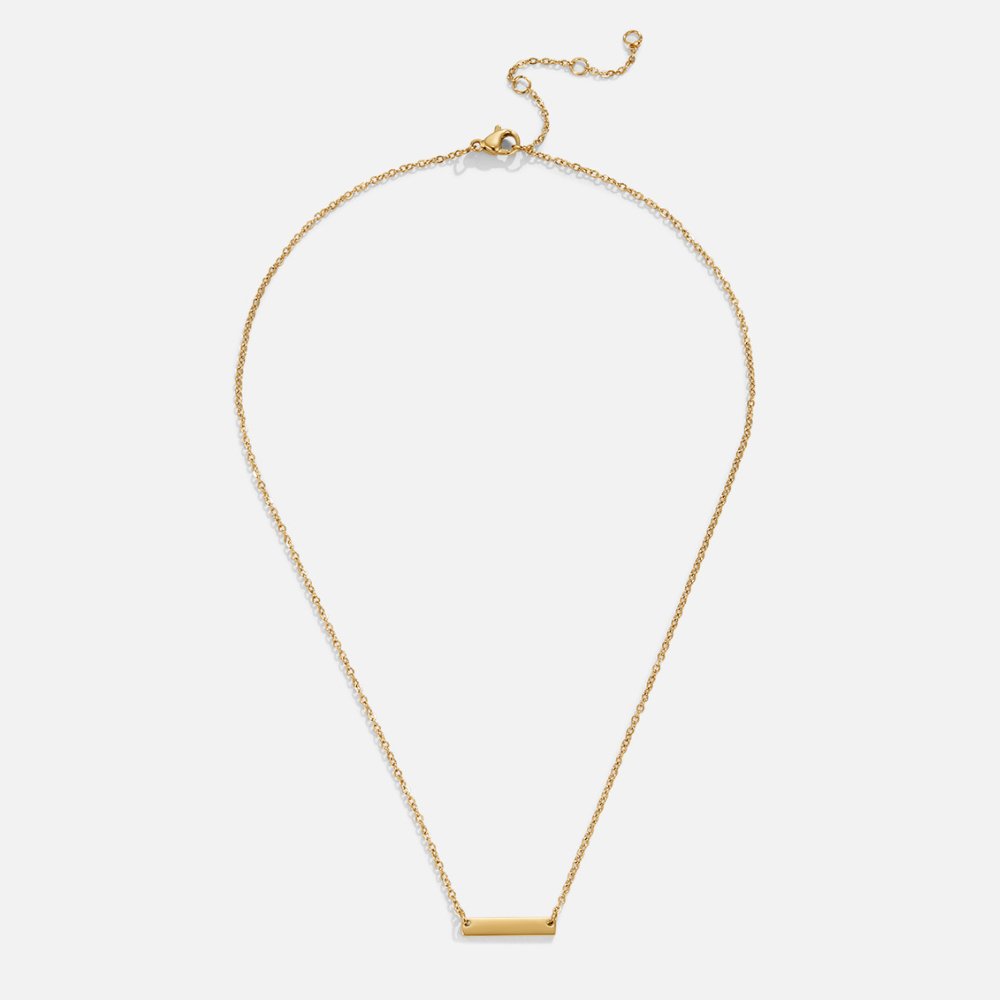 Rina Gold Bar Necklace, laid flat on white, gold bar pendant on fine chain
