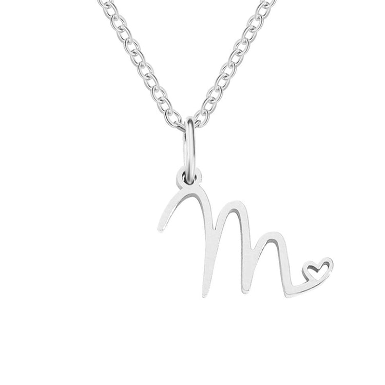 Silver Letter Heart Necklace, silver script letter pendant with a small heart cutout on a fine chain