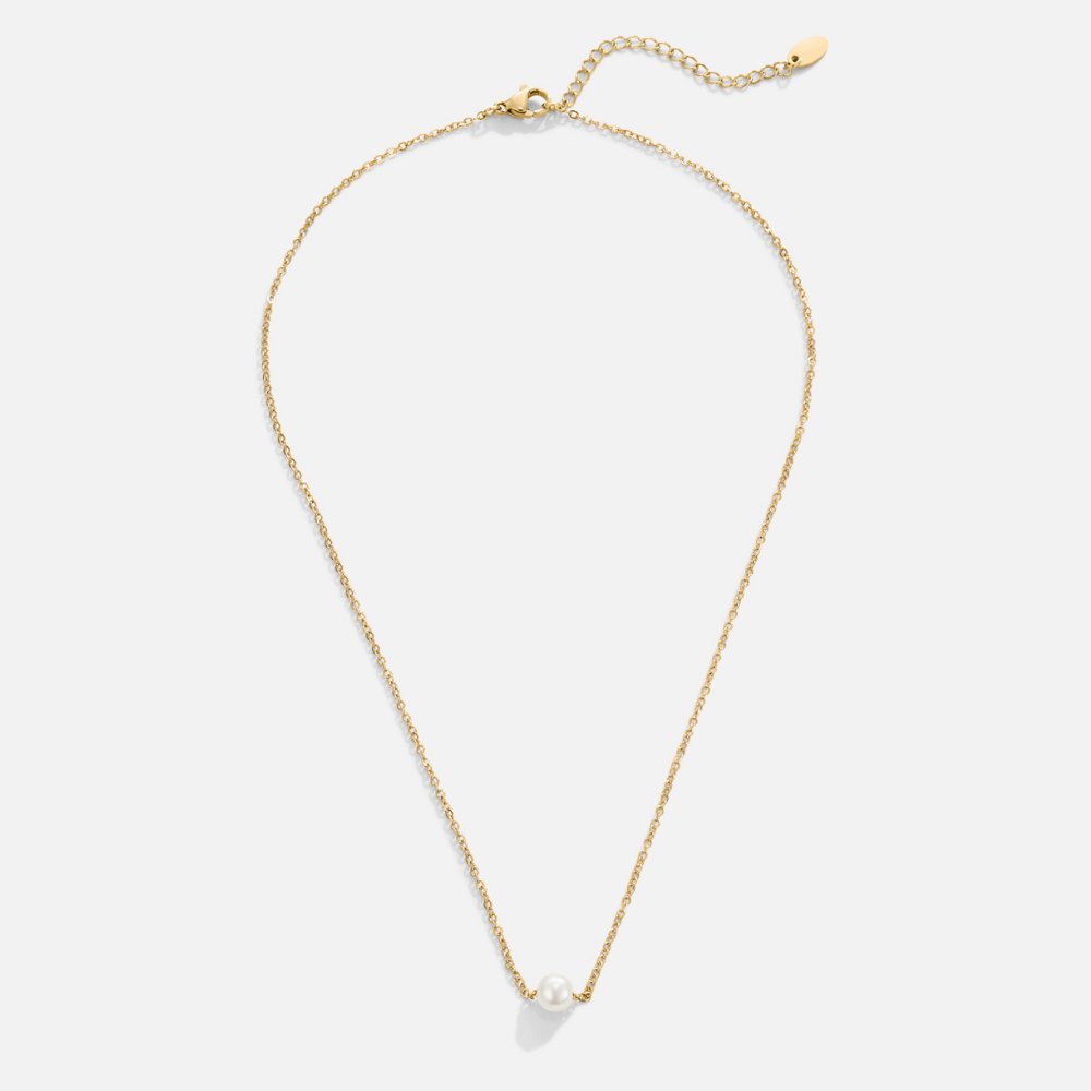 Solitaire Gold Pearl Necklace, flat lay of a thin gold chain with a single white pearl at the centre