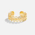 Summer Bloom Leaf Ring, open cuff ring on a white background, leaf pattern in gold