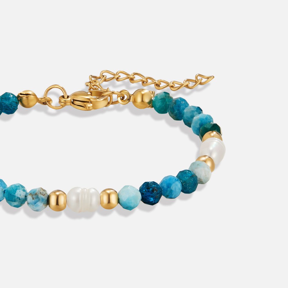 Turquoise Blue & Pearl Bead Bracelet, close-up of a beaded bracelet with gold clasp and
